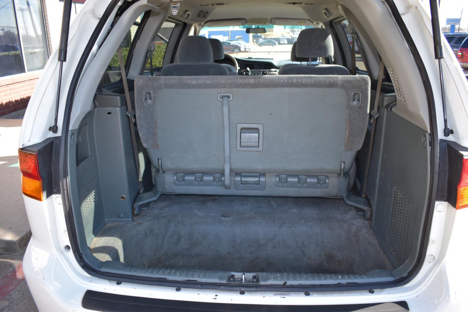 2003 White /Gray Honda Odyssey (5FNRL18513B) , located at 5925 E. BELKNAP ST., HALTOM CITY, TX, 76117, (817) 834-4222, 32.803799, -97.259003 - Buying a 2003 Honda Odyssey can be a smart choice for several reasons: Reliability: Hondas are known for their reliability, and the Odyssey is no exception. The 2003 model year is often praised for its durability and long-lasting performance. Safety: The 2003 Honda Odyssey comes equipped with safe - Photo#24